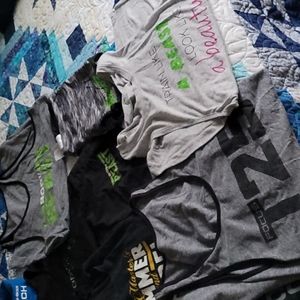 Bulk Beachbody workout shirts and shorts